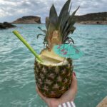 Famous drink served in a pineapple in Comino Island